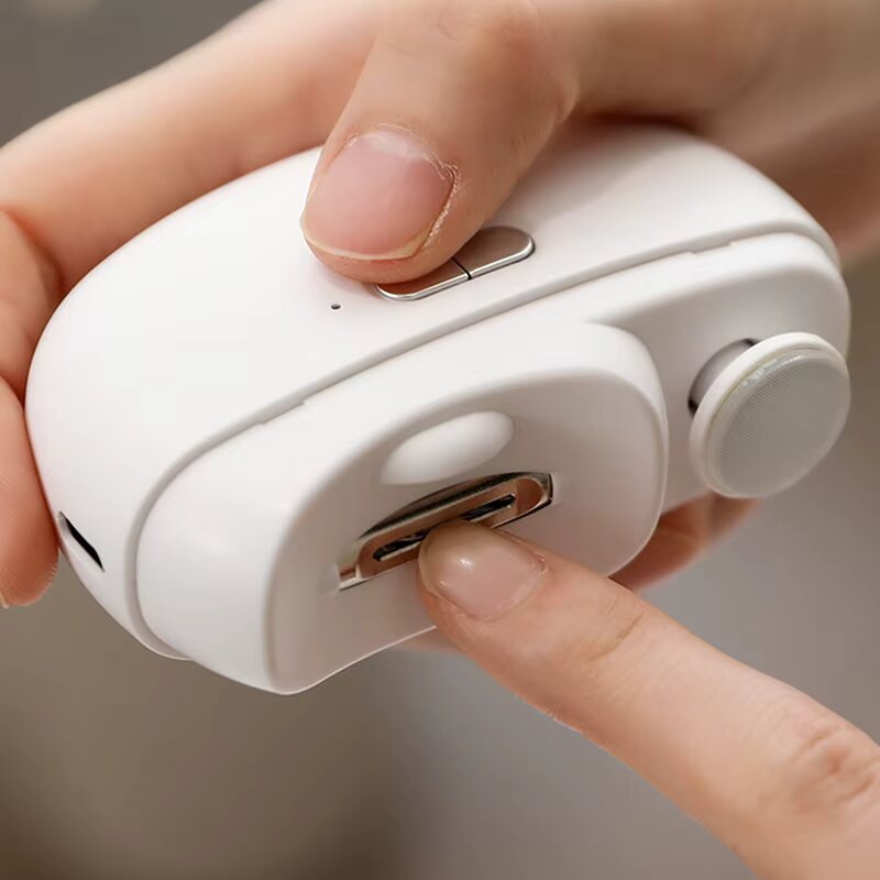 Corta uñas automático